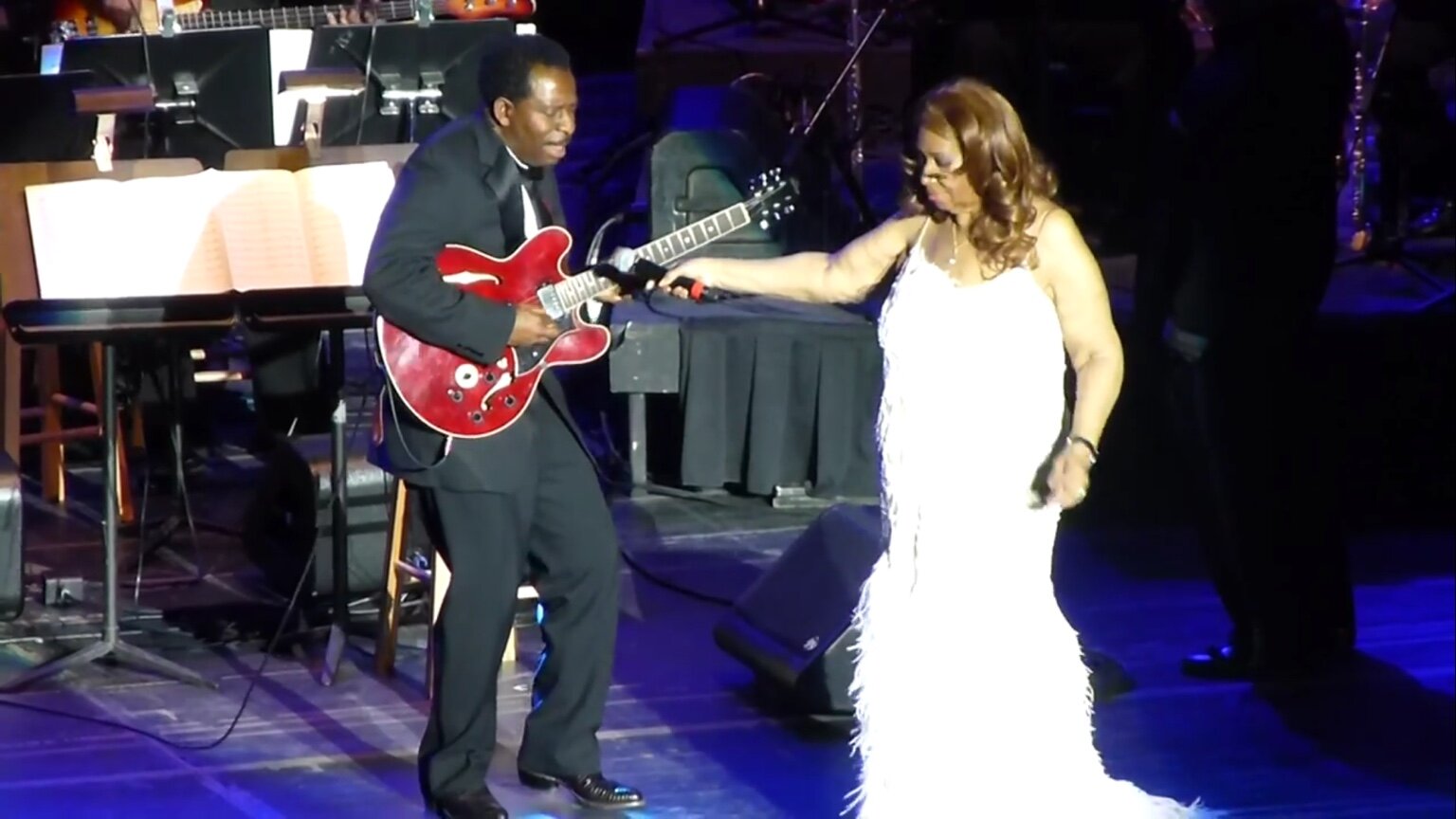 Wil A. Crosby performing with Aretha Franklin